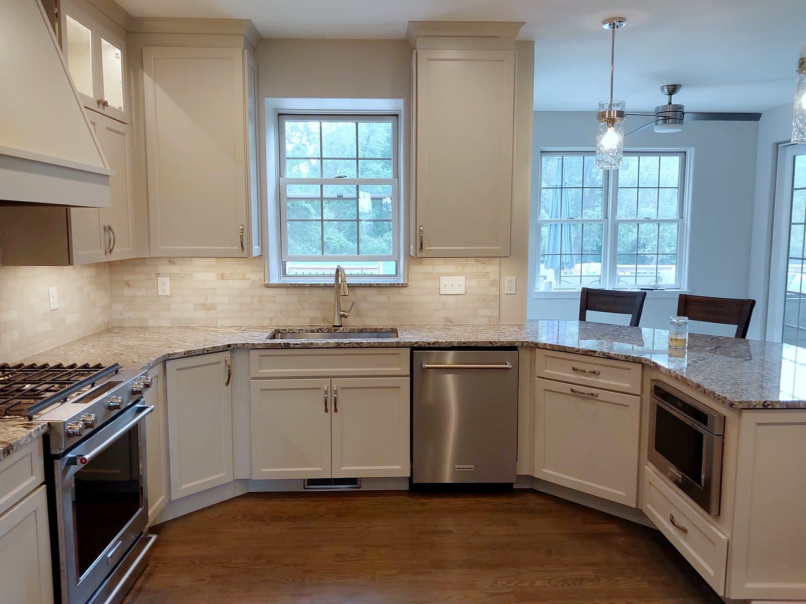 Remodeled kitchen with white cabinets